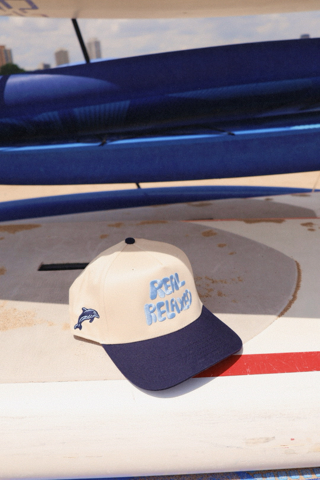 Resort Club: Dolphin Bay Hat Cream & Navy